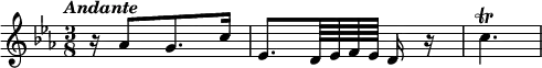 { \tempo \markup \italic "Andante" \key ees \major \time 3/8 \relative a' {
  r16*1/2 aes8[ g8. c16*1/2] |
  ees,8.[ d64 ees f ees] d16 r | c'4.\trill } }