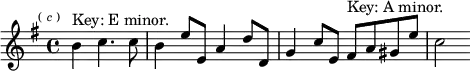 
\relative b' { \key e \minor \time 4/4 \partial 2. \mark \markup \tiny { ( \italic c ) } b4^"Key: E minor." c4. c8 | b4 e8 e, a4 d8 d, | g4 c8 e, fis^"Key: A minor." a gis e' | c2 }