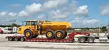 A large truck on a trailer